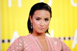 Recording artist Demi Lovato arrives at the 2015 MTV Video Music Awards in Los Angeles, California. 