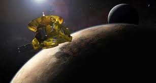 An artist's impression of NASA's New Horizons spacecraft encountering Pluto and its largest moon, Charon, is seen in this NASA image from July 2015.