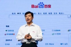 Baidu CEO Robin Li speaks at the Baidu World conference in Beijing, announcing plans to compete with other Chinese firms in O2O services.