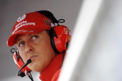 Former Ferrari driver Michael Schumacher of Germany looks on during the qualifying session for the Italian F1 Grand Prix race at the Monza racetrack