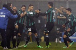 U.S. Sassuolo Calcio players celebrate after a goal.