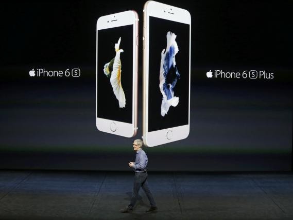 Apple CEO Tim Cook introduces the iPhone 6s and iPhone 6sPlus during an Apple media event in San Francisco, California, September 9, 2015.