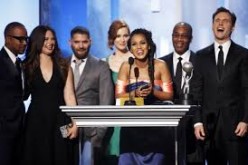 Actress Kerry Washington (C) and the cast and crew of 