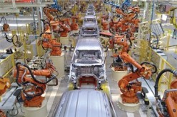  Automated workers or robots work at an automobile manufacturing facility in Tianjin.