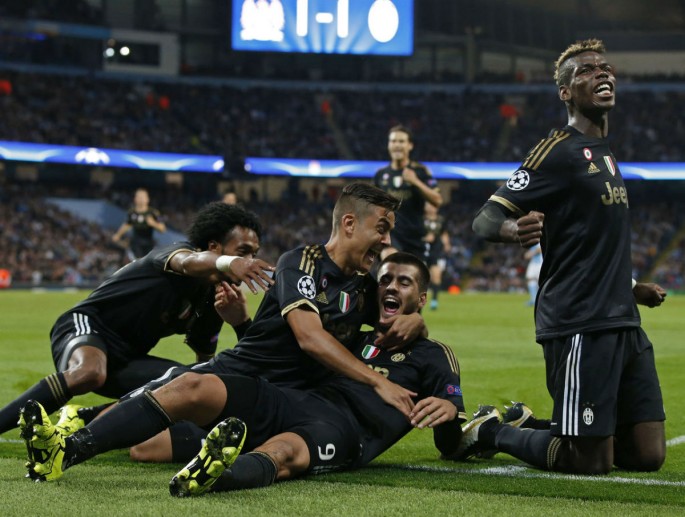 Juventus players celebrate Champions League win over Manchester City.