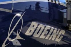 The Boeing logo is seen on a Boeing 787 Dreamliner airplane in Long Beach, California, March 14, 2012.