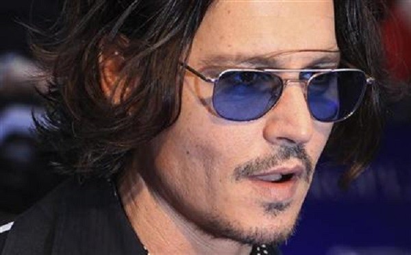 Actor Johnny Depp arrives for the European premiere of Dark Shadows 
