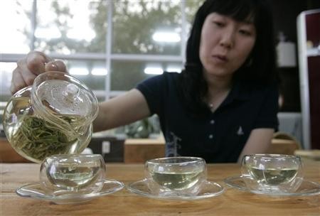 Woman Making Green Tea