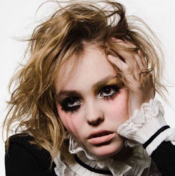 Teen model Lily-Rose Depp strikes a pose for the new Vogue Paris.