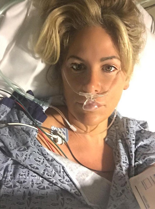"DWTS" star Kim Zolciak was in a hospital bed after suffering a mild stroke.