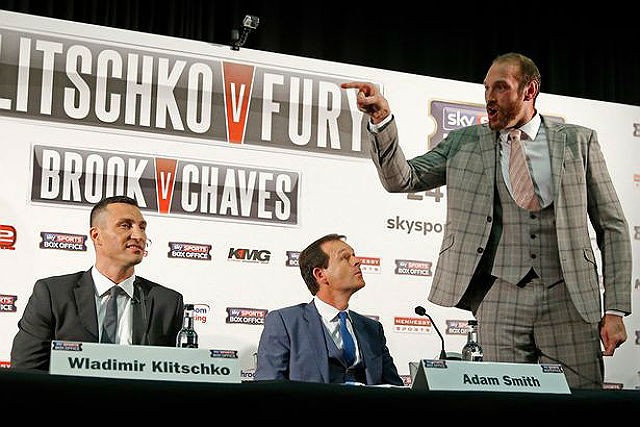 Tyson Fury trash talks to Wladimir Klitschko during the recent press conference of their fight before the postponement was announced.