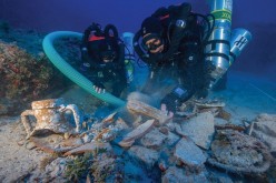 Divers check out the treasures and artifacts from the wreckage of a merchant ship that sank in the tiny Greek island of Antikythera; some of them are showcased at the Antikenmuseum Basel. 