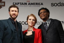 Cast members Chris Evans, Scarlett Johansson and Samuel L Jackson pose at the French premiere of the film ''Captain America: The Winter Soldier'' in Paris.