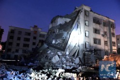 Damaged buildings at a blast site in Lizhou, in south China's Guangxi Zhuang Autonomous Region, on Sept. 30, 2015.