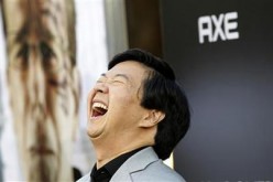  Cast member Ken Jeong laughs at the premiere of ''The Hangover Part II'' at Grauman's Chinese theatre in Hollywood, California May 19, 2011.