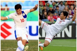 Philippines' Phil Younghusband (L) and North Korea's Jong Il-gwan.