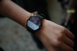 A representative presents a Motorola Moto 360 watch is seen during the Google I/O Developers Conference at Moscone Center on June 25, 2014 in San Francisco, California.