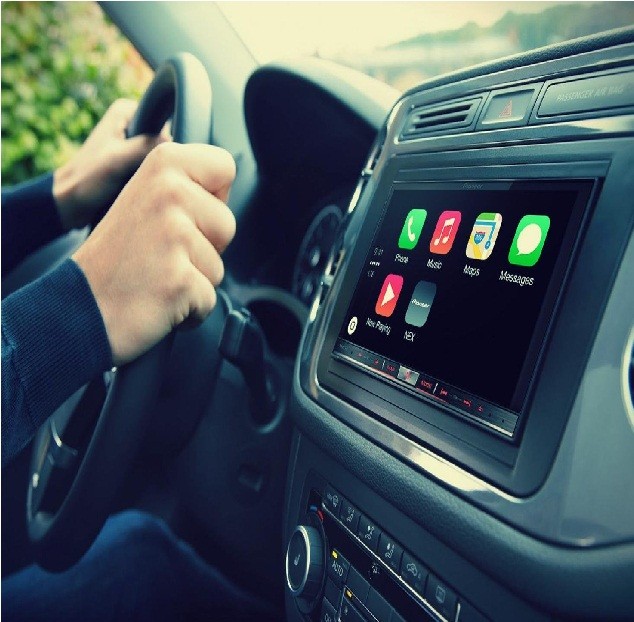 A car's dashboard showing apps featured by Android Auto.