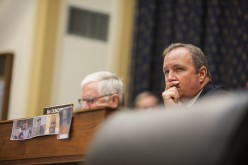 Congressman Jeff Duncan at his seat with pictures of the four Americans imprisoned in Iran during a House Committee on Foreign Affairs hearing on President Obamas nuclear agreement with Iran in Washington, USA on July 28, 2015.