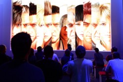 Attendees watch a trailer for Square Enix Unveils Final Fantasy XV video game at the E3 Electronic Entertainment Expo, in Los Angeles, California June 12, 2013.