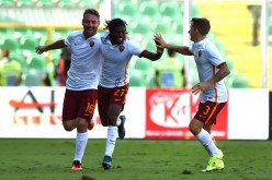 Kouassi Gervinho (middle) celebrates with Daniele De Rossi and Lucas Digne after scoring a double versus Palermo.