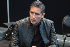 Actor Jim Caviezel poses in the press room for the 'Person of Interest' panel during Comic-Con Day 4 at The Jacob K. Javits Convention Center on October 11, 2015 in New York City.