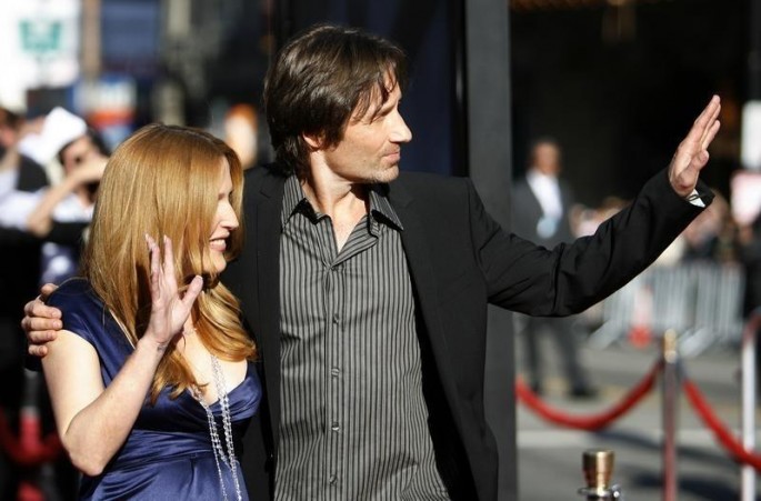 Cast members David Duchovny (R) and Gillian Anderson at the movie premiere of "The X-Files: I Want to Believe" 