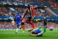Sadio Mane of Southampton and Branislav Ivanovic of Chelsea compete for the ball during their Premier League match.