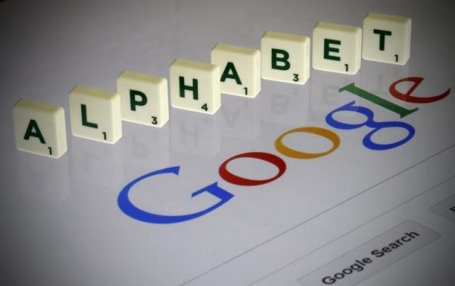 Letters spell the word ''Alphabet'' as they are seen on a computer screen with a Google search page