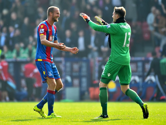 Brede Hangeland (L) and Wayne Hennessey (R) of Crystal Palace celebrate their 2-0 win over West Brom.