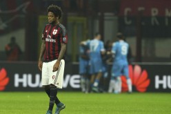 Luiz Adriano of AC Milan looks dejected after their 0-4 loss to Napoli.