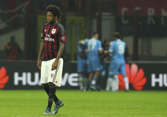 Luiz Adriano of AC Milan looks dejected after their 0-4 loss to Napoli.