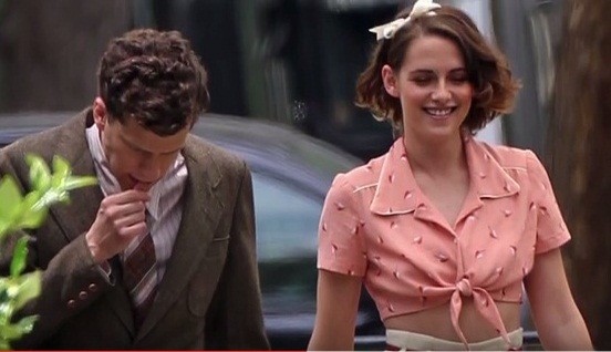 Kristen Stewart wears a peach knotted blouse with her soft curls, to get into character for the new Woody Allen film; Jesse Eisenberg co-stars.