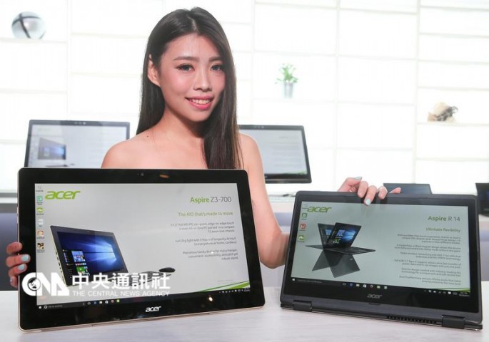 A model displays the Aspire R14 laptop and the Aspire Z3-700 PC. Both devices run on the latest Microsoft Windows 10 operating system.