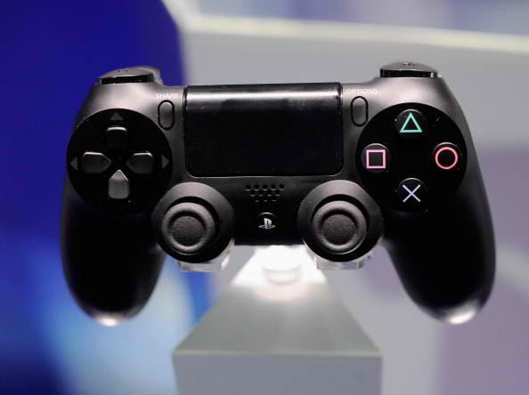 A Playstation 4 and its controller is on display at the Sony Playstation E3 2013 booth at the Los Angeles Convention Center on June 11, 2013 in Los Angeles, California. 