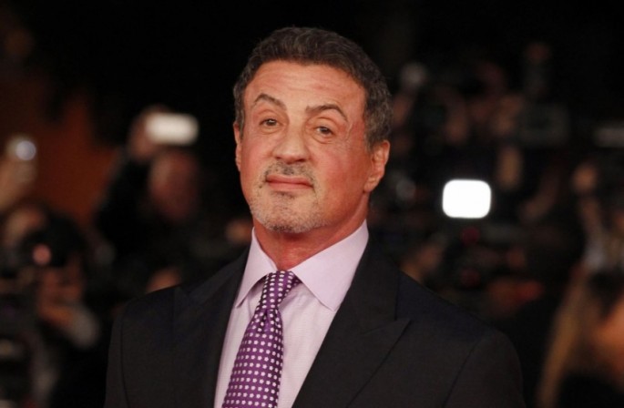 "The Expendables" actor Silvester Stallone poses for a photo during an event.