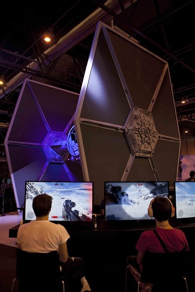 Videogamers play on US game developer, publisher and distributor Electronic Arts (EA)'s 'Star Wars Battlefront', during the Madrid Games Week 2015 in Madrid on October 1, 2015.