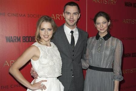 Teresa Palmer, Nicholas Hoult and Analeigh Tipton attend a screening of the film ''Warm Bodies'' in New York January 25, 2013.