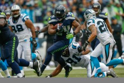 Seattle Seahawks running back Marshawn Lynch (#24) rushes against the Carolina Panthers in their Week 6 match.