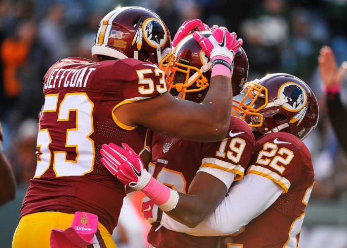 Washington Redskins' Rashad Ross (#19) is congratulated by teammates Jackson Jeffcoat (#53) and Stevan Ridley (#22) after scoring a fourth quarter touchdown against the New York Jets last week.