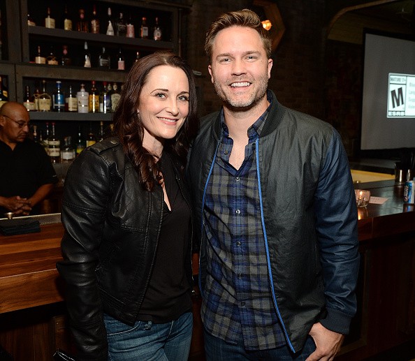 Actors Courtenay Taylor (L) and Scott Porter attend the Batman: Arkham Knight VIP Launch at The Line Hotel on June 22, 2015 in Los Angeles, California.
