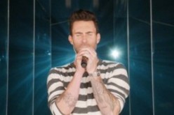 Adam Levine, Maroon 5 frontman, gives his all singing.