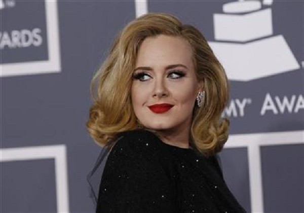 Adele has confirmed that there would be a world tour to promote her new album titled "25"
