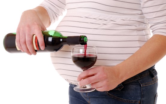 Pregnant woman drinking alcohol