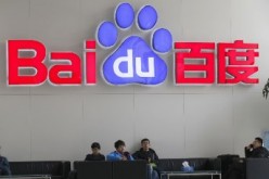 Visitors sit at the lobby of Baidu headquarters in Beijing.
