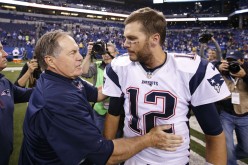 New England Patriots head coach Bill Belichick (L) and quarterback Tom Brady.