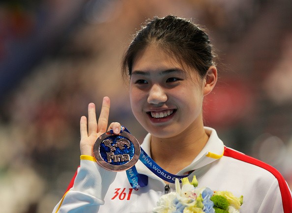 Yufei Zhang poses during the medal ceremony for the Women's 200m Butterfly at the 16th FINA World Championships at the Kazan Arena on Aug. 6, 2015, in Kazan, Russia.