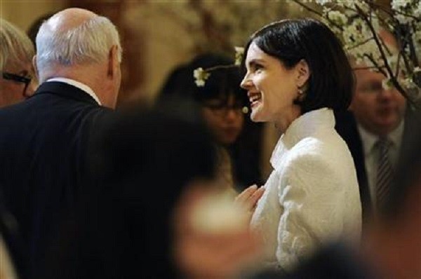 Elizabeth McGovern attends a luncheon for Britain's Prime Minister David Cameron at the State Department in Washington.
