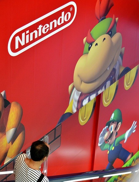 A Nintendo logo and its game characters are displayed at an electronics retail shop in Tokyo on July 29, 2015.