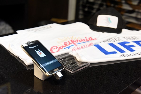 Consumers customize complimentary shirts, tote bags, and Samsung Galaxy S 6 edge at the Samsung Studio LA .